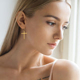 Pair of Gold Rose Gold Steel Hoop Earrings With Cross Dangle